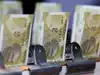India's forex reserves hit record high of $729.33 billion after $12.4 billion weekly jump