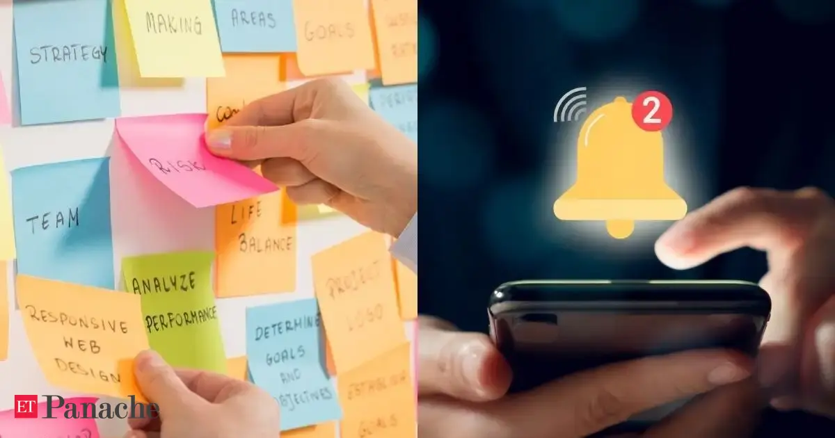 Close-up of a desk covered in colorful sticky notes with various handwritten reminders and tasks.