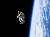 In 2006, ISS astronauts threw an old Russian spacesuit stuffed with clothes into orbit; SuitSat circled Earth twice before its radio signal became unexpectedly weak