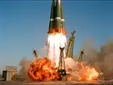 In 2000, a crew for the first time headed for the International Space Station aboard a Russian Soyuz rocket for four months to prepare ISS facility for research