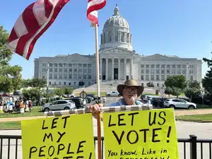 Steve Dakopolos demonstrates in front of the state Capitol in Jefferson City, Mo., Wednesday, Sept. 2, 2026, in support of a referendum petition seeking a statewide vote on a congressional redistricting plan.