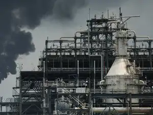 FILE PHOTO: A flame rises from a gas flare at the Dangote refinery refinery in Lagos, Nigeria