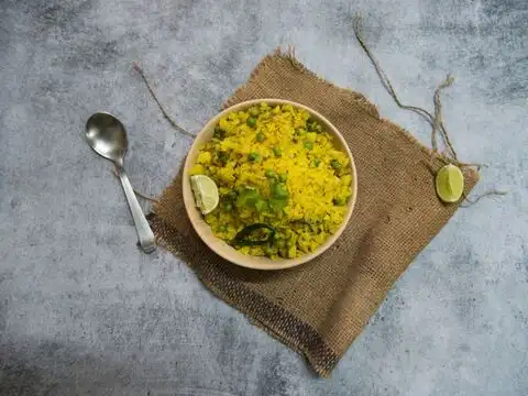 Poha With Moong Dal Mixed Into The Batter