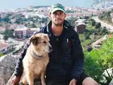 In 2015, a New Jersey man set out to walk around the world with his dog; seven years and roughly 28,000 miles later, they made it back home