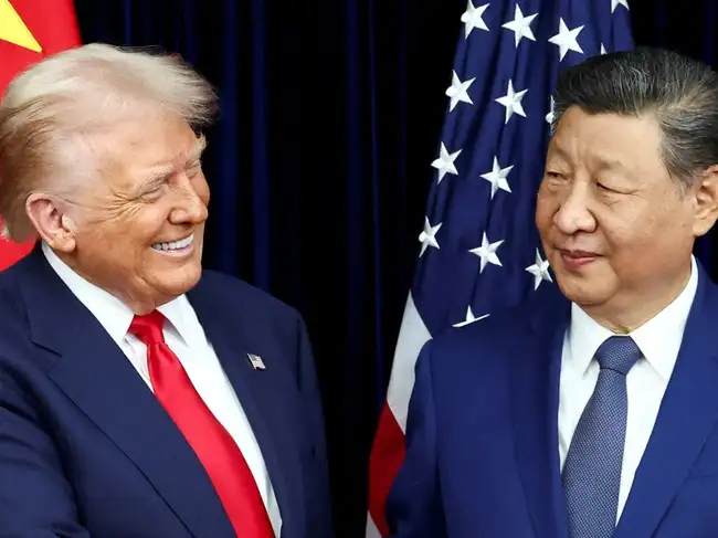 FILE PHOTO: U.S. President Donald Trump meets with Chinese President Xi Jinping on the sidelines of the APEC summit, in Busan