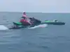 6-year-old swept hundreds of yards into Lake Michigan on inflatable raft; father-son jet skiers race to rescue him