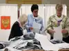 Main Kremlin party keeps control of Russia's parliament after a carefully orchestrated vote
