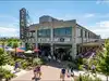 A developer planned a beer garden at a vacant aviation plant; the idea grew into a $25 million, 22-acre marketplace with 140,000 square feet of space