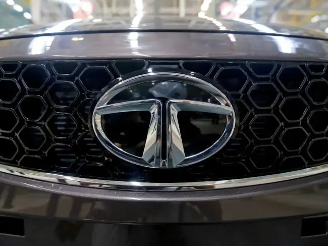 FILE PHOTO: A Tata Tigor car is pictured at the assembly line inside the Tata Motors car plant in Sanand, on the outskirts of Ahmedabad