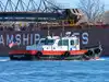 Since 1874, a boat on the Detroit River has passed mail to freighters that never stop, hauled up in a bucket on a rope; it has its own ZIP code: 48222