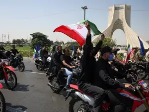 Members of Iranian militia forces (Basij) ride on motorcycles as they participate in a march in Tehran, Iran, September 25, 2026.