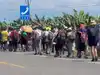 Hundreds of migrants head towards US border as Trump's popularity dwindles ahead of midterm polls