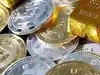 Gold, silver slide as buyers wait for prices to stabilise