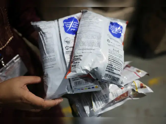 Maharashtra Food and Drug Administration officials raid a warehouse in Turbhe