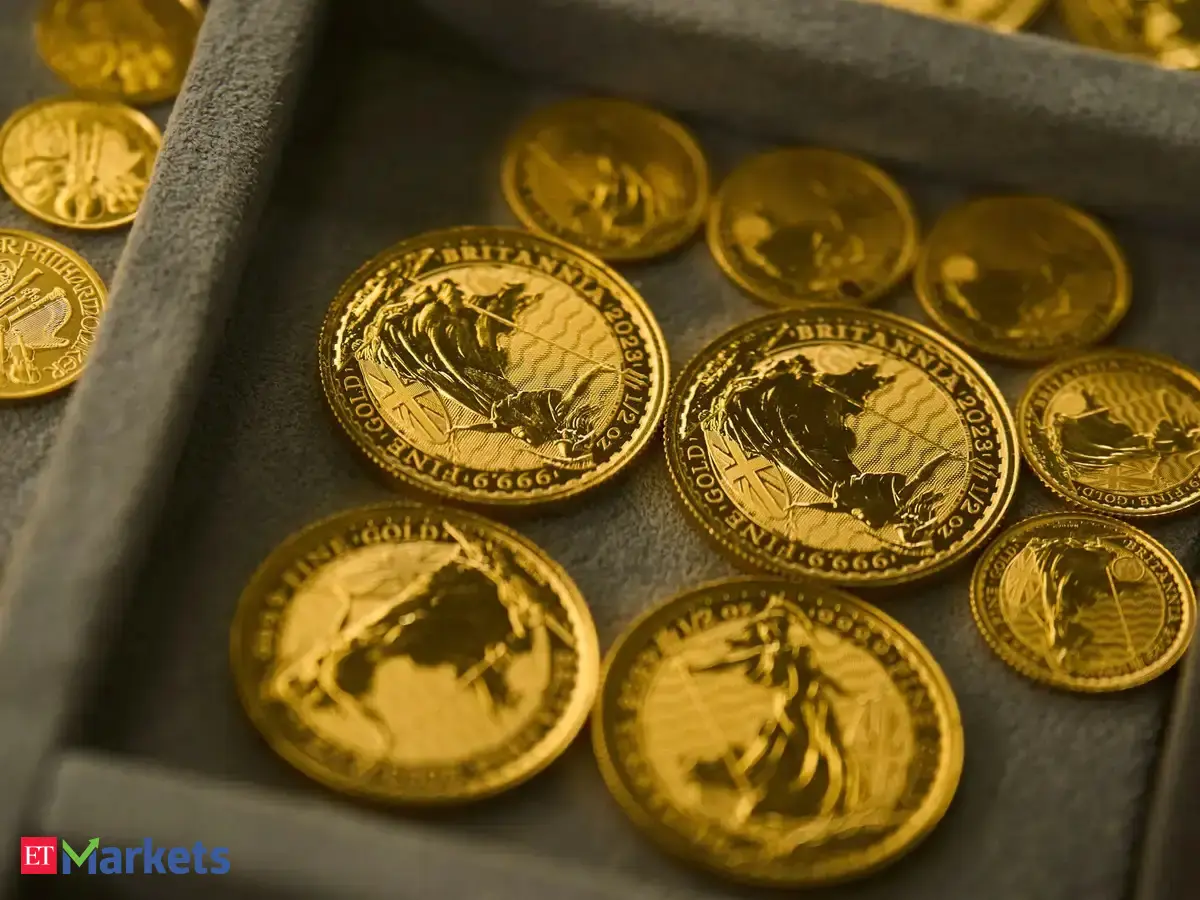 Gold inches up as October Fed rate hike prospects fade
