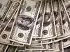 Dollar holds firm as French fiscal woes keep euro on back foot