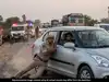Rs 4 crore gold robbery at railway station: Victim&rsquo;s quick photo leads police to getaway car, cop clings to fleeing vehicle and is dragged 500 metres before stopping it
