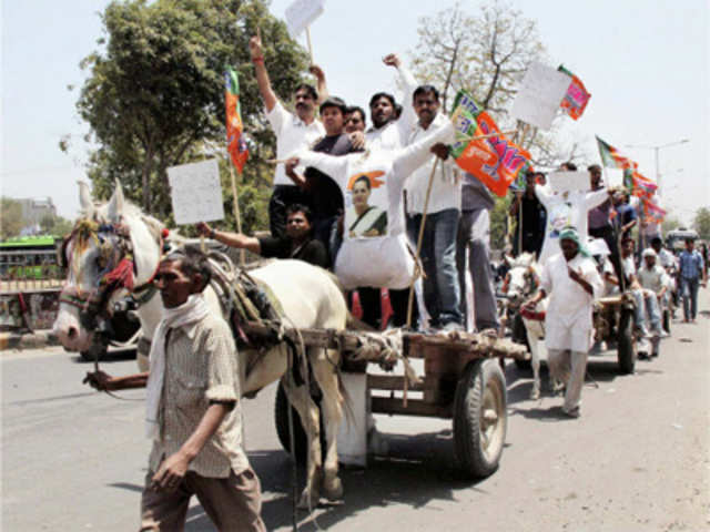 BJP, HJC workers protest against petrol price hike