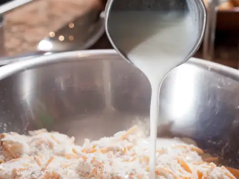 Add milk and let the mixture simmer