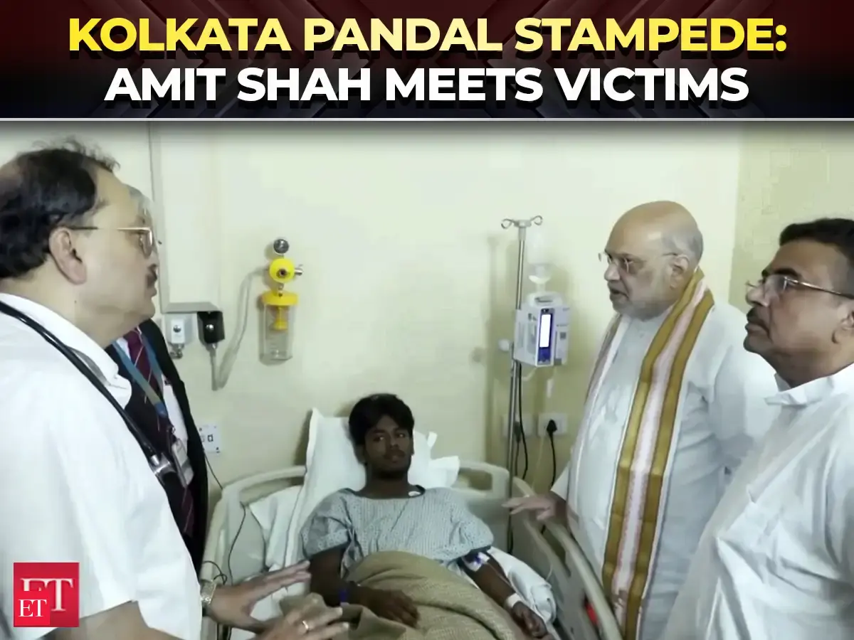 Kolkata pandal tragedy: Amit Shah meets victims of Chorbagan Durga Puja ...