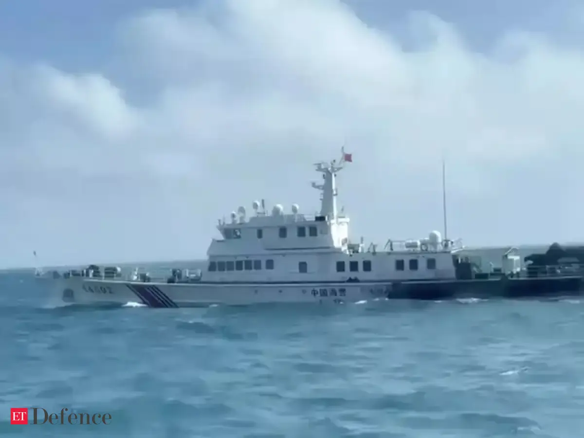 China sends naval forces to monitor US warship near disputed shoal