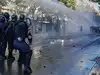Albanian police clash with anti-government protesters for an 8th day