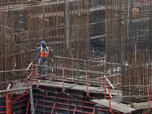 A man works on a construction site of a residential building in Mumbai, India, October 31, 2016.