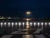 Some US runways have pulsing white lights across their path: When switched on, they mark the point where a landing aircraft must stop short