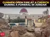 Eight killed and 40 injured after gunmen open fire at church funeral in Jordan