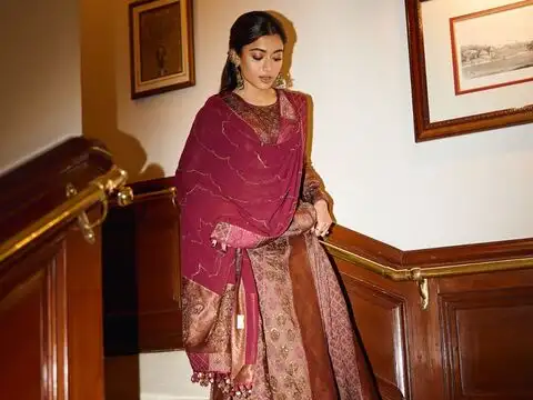 Rashmika Mandanna's maroon and gold ethnic suit