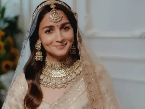 Ivory embroidered suit for an elegant Karwa Chauth look