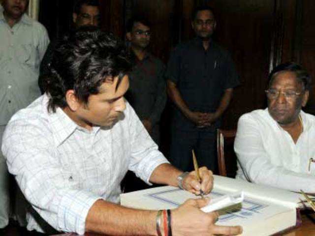 Sachin Tendulkar signs a parliamentary registration book