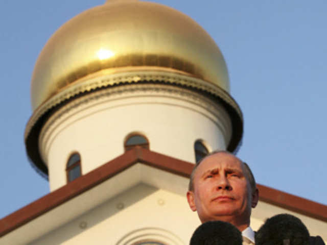 Vladimir Putin speaks at a ceremony