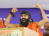 Govt may slap tax evasion charges on hostile yoga guru Baba Ramdev
