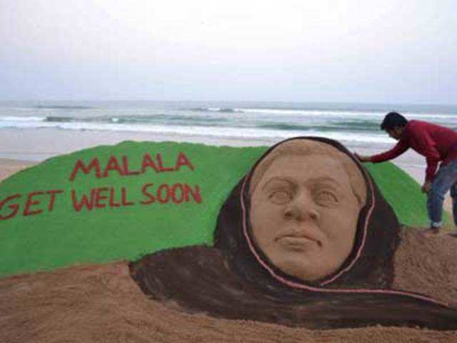 Sand sculpture in honour of Pakistani girl Malala Yousufzai at Puri beach