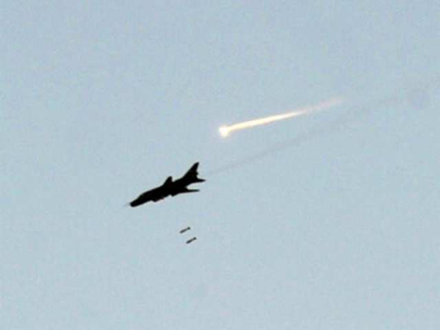 A Syrian army fighter jet raids the northwestern town of Maaret al-Numan