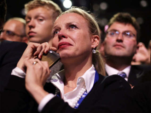 A supporter cries as President Barack Obama speaks in Chicago