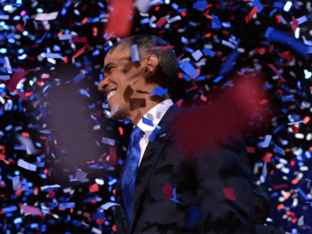 US President Barack Obama celebrates