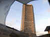 Sensex, Nifty end in green; auto, FMCG, realty up
