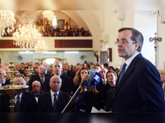 Greek PM Antonis Samaras speaks during a memorial ceremony