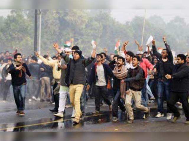 Protesters shout slogans during protest against Delhi rape case