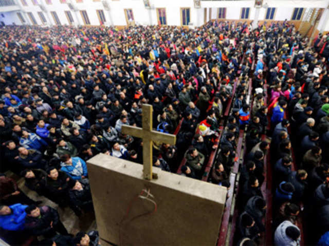 Catholics attend a Christmas eve mass in China