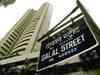 Markets open flat; oil&gas stocks up, Tata Motors plunges