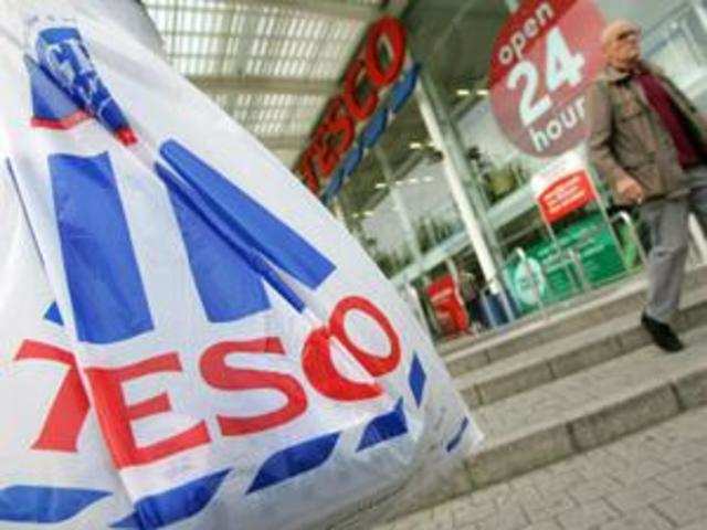 Tesco takes on rivals with instant vouchers in new price pledge