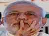 Narendra Modi created deep chasm, retorts Congress on his potholes barb