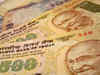 Rupee gains, awaiting macro data for cues