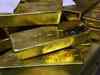 Gold loses safe haven tag; Goldman cuts price forecast through 2014