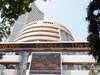 Sensex hovers above 18,800; realty, banks advance