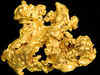 Precious gold up in futures trade on global cues