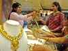 Gold, crude oil prices drop: Top trading bets by experts